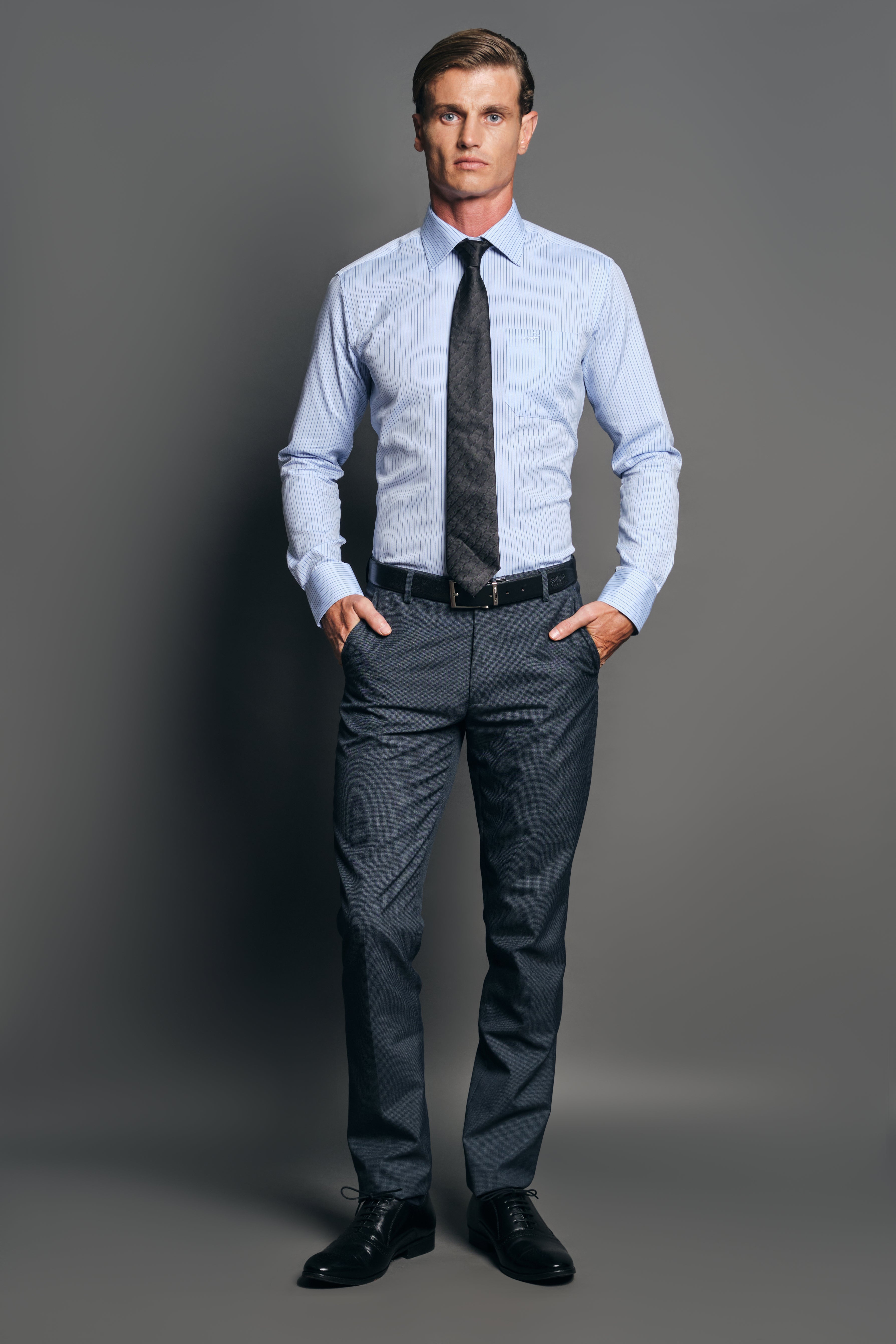 25,215 Blue Shirt Grey Pants Stock Photos, High-Res Pictures, and Images -  Getty Images